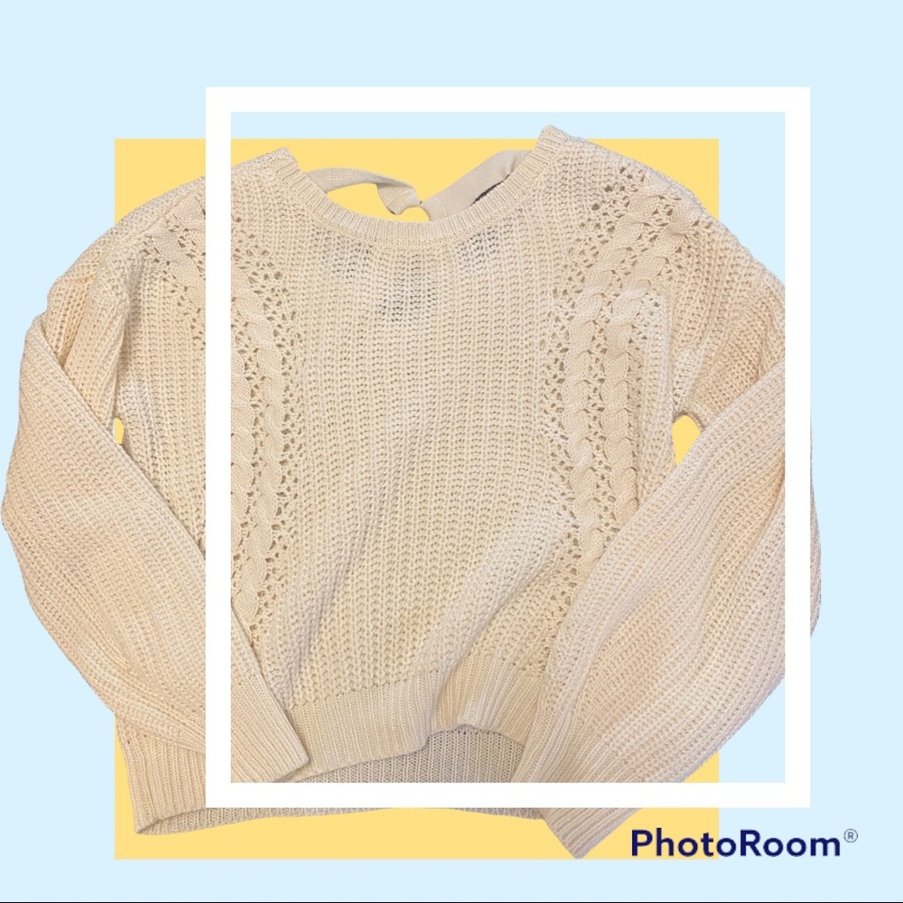 Almost Famous- Sweater with details on the back. Size: M